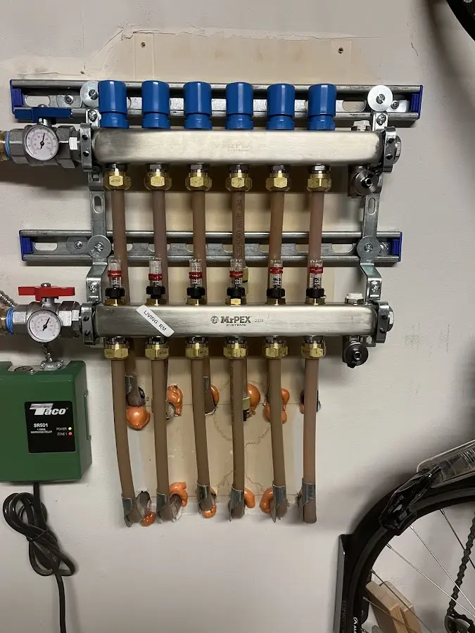 Plumber performing Gas Line Installation at a residential property in Suamico